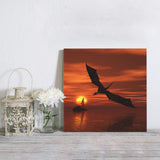 Dinosaur wings sky sunset white clouds Canvas painting - LeobonZone